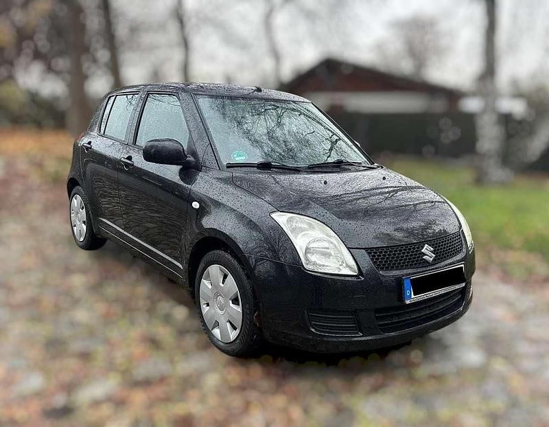 Schwarz Gebraucht 2009 Suzuki Swift Club Kleinwagen | 4.650 € (Fairer Preis) - Bild 1/4
