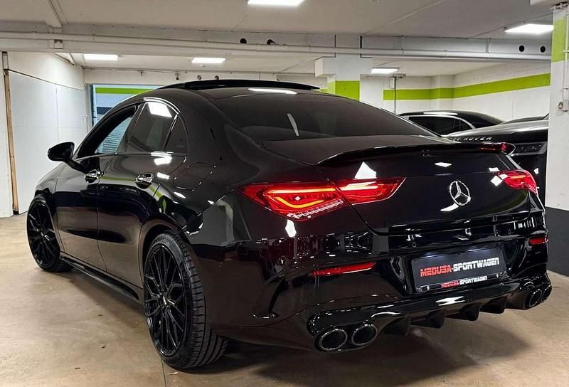 Schwarz Gebraucht 2022 Mercedes CLA45 AMG AMG Coupé | 37.500 € - Bild 1/4