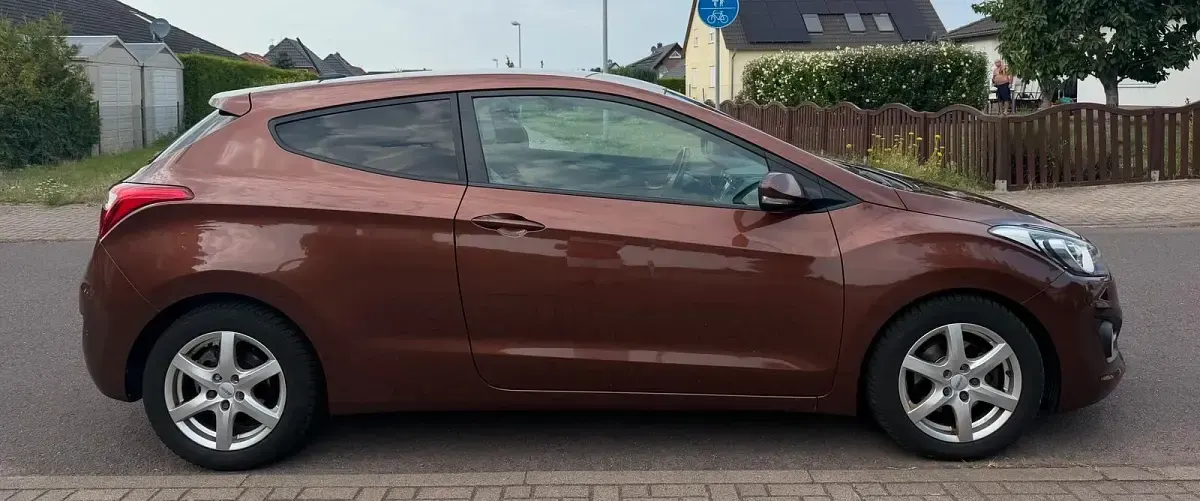 Gebraucht Hyundai i30 128 PS (94 kW) 2013 Orange Coupé
