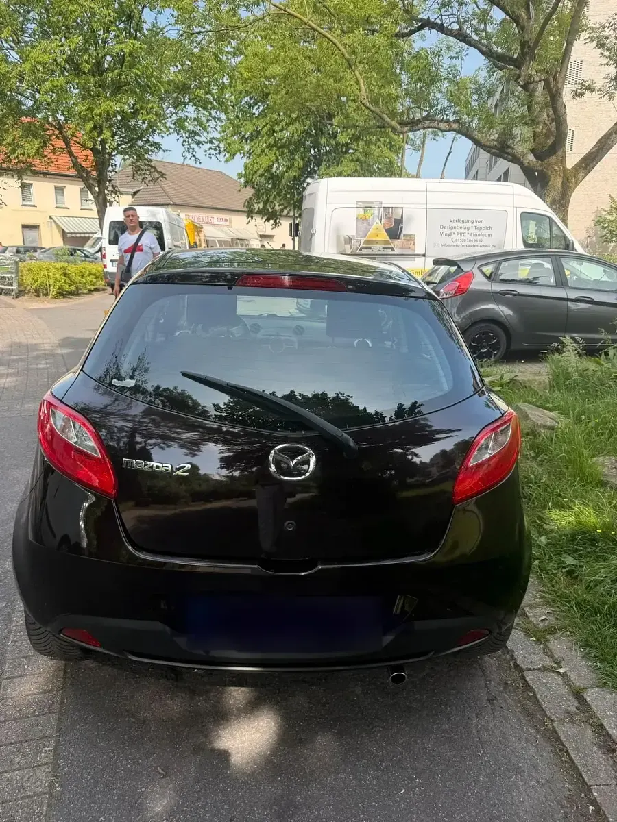 Gebraucht Mazda 2 75 PS (55 kW) 2010 Schwarz Kleinwagen