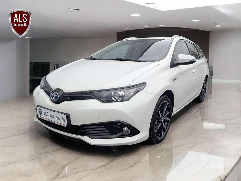 Super white 2 Gebraucht 2018 Toyota Auris Hybrid Team Kombi | 15.999 € (Fairer Preis) - Bild 1/4