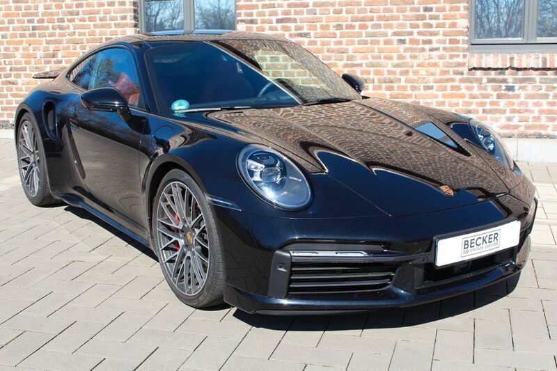 Tiefschwarzmetallic Gebraucht 2021 Porsche 992 Coupé | 174.800 € - Bild 1/4
