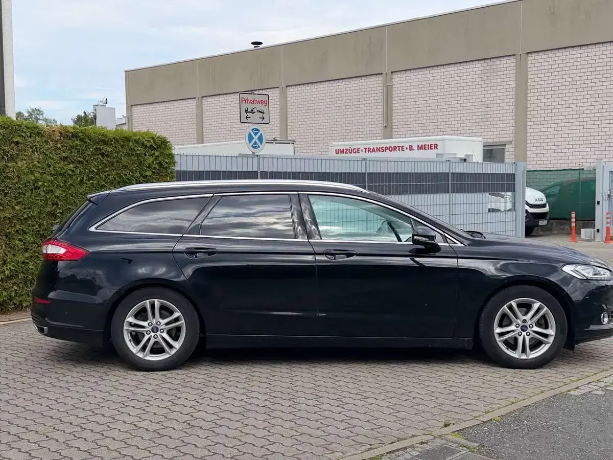 Gebraucht Ford Mondeo Titanium 179 PS (131 kW) 2016 Iridiumschwarz metallic Kombi