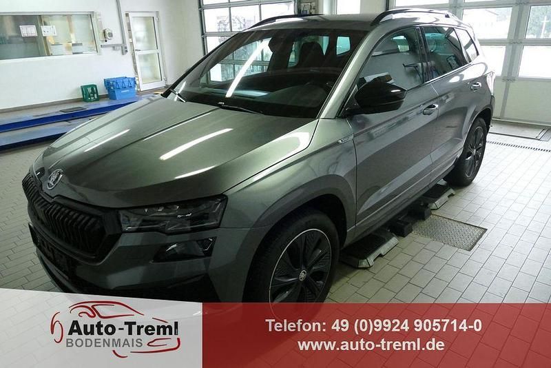 Graphite grau Gebraucht 2022 Skoda Karoq SportLine SUV | 31.890 € (Guter Preis) - Bild 1/4