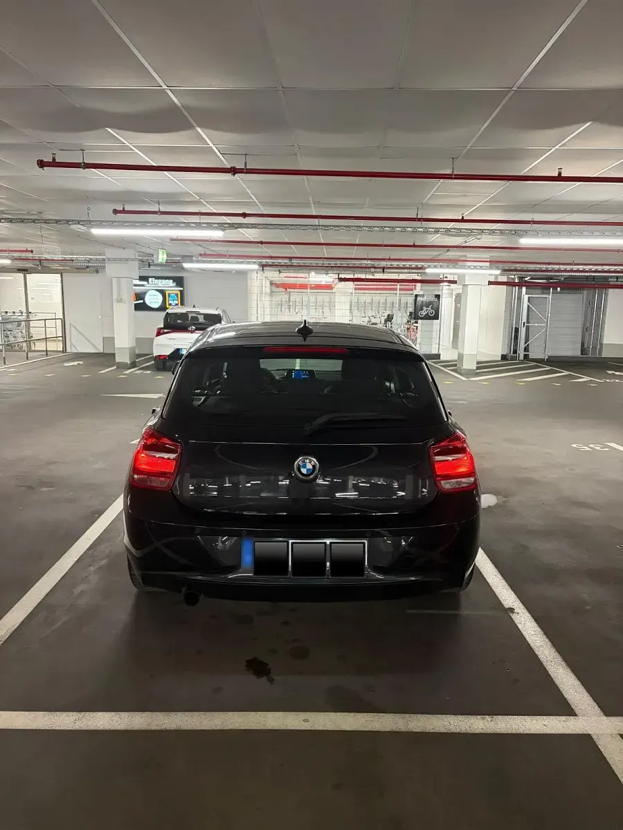 Gebraucht BMW 118 Sport Line 170 PS (125 kW) 2011 Schwarz Kleinwagen