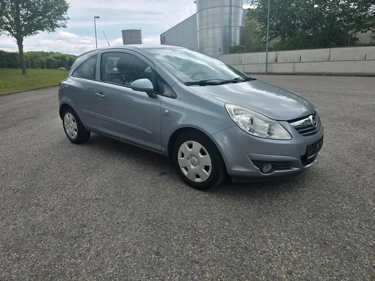 Usado Opel Corsa Catch Me 80 HP (58 kW) 2007 Cinzento Citadino