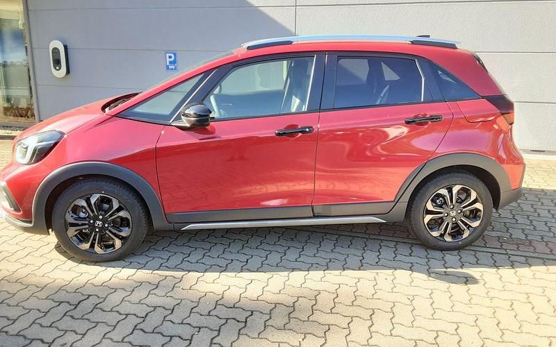 Gebraucht Honda Jazz Advance 107 PS (78 kW) 2025 Premium crystal red metallic Kleinwagen