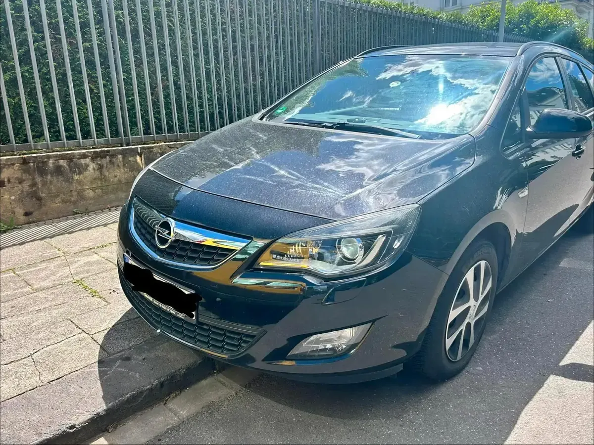 Gebraucht Opel Astra 120 PS (88 kW) 2011 Schwarz Kombi