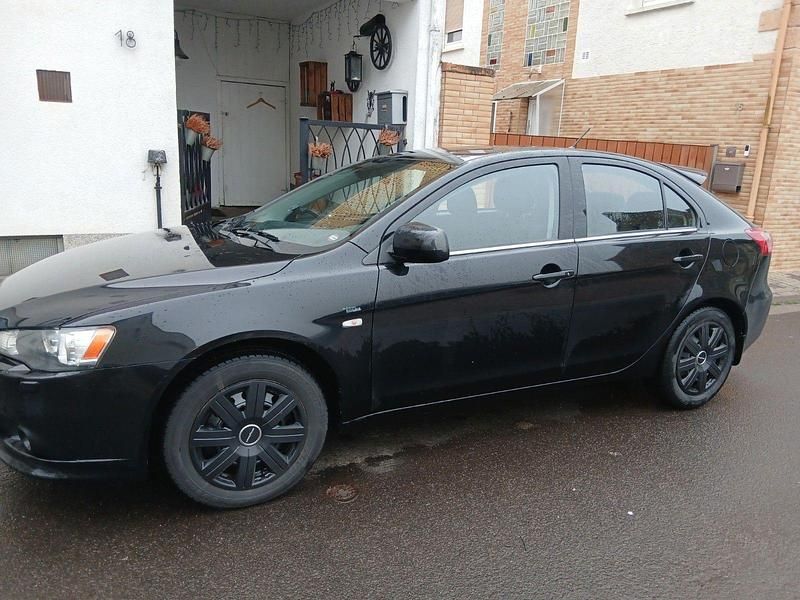 Gebraucht Mitsubishi Lancer 117 PS (86 kW) 2012 Schwarz Limousine