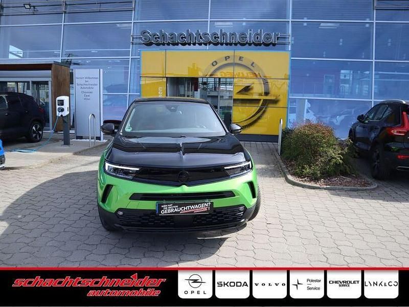 Ikone grün metallic Gebraucht 2024 Opel Mokka SUV | 24.990 € (Fairer Preis) - Bild 1/4