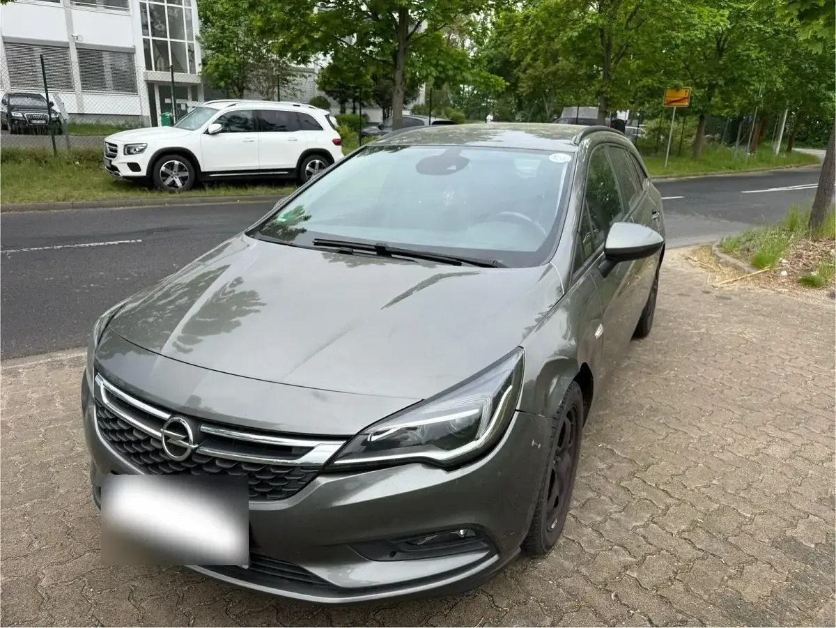 Gebraucht Opel Astra 110 PS (80 kW) 2017 Grau Kombi