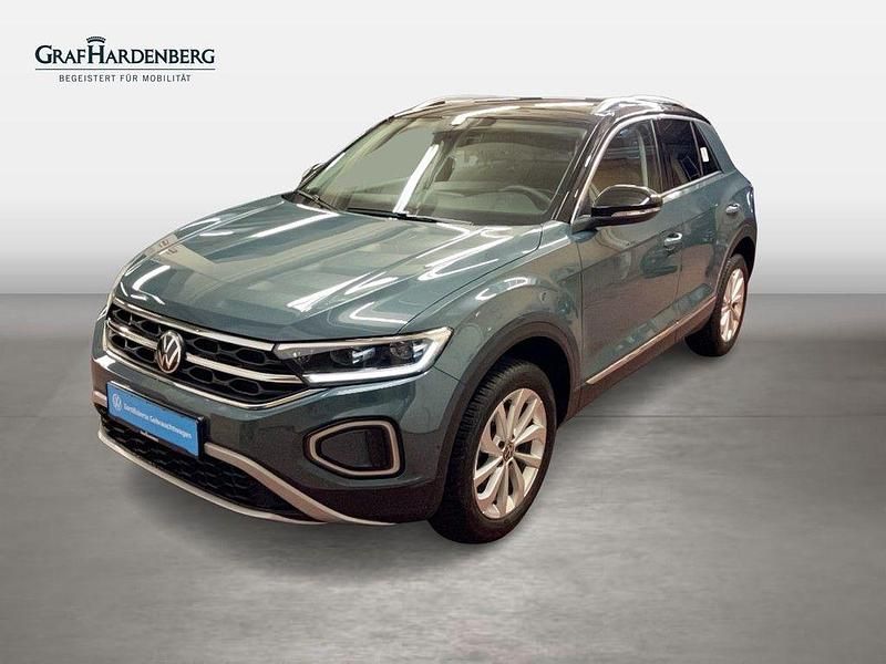 Blau Gebraucht 2024 VW T-Roc Style SUV | 29.210 € (Guter Preis) - Bild 1/4