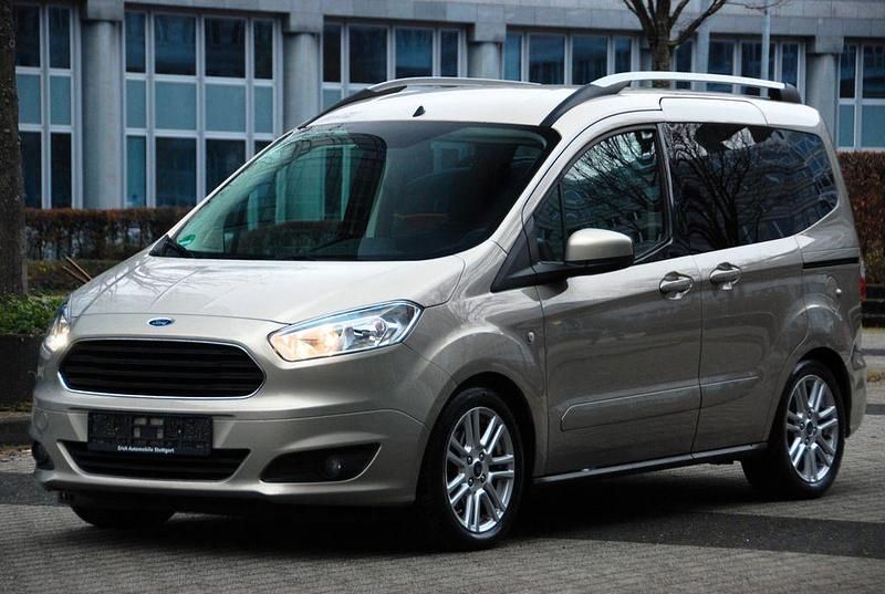 Silber Gebraucht 2014 Ford Tourneo Courier Trend Van / Kleinbus | 9.490 € (Guter Preis) - Bild 1/4