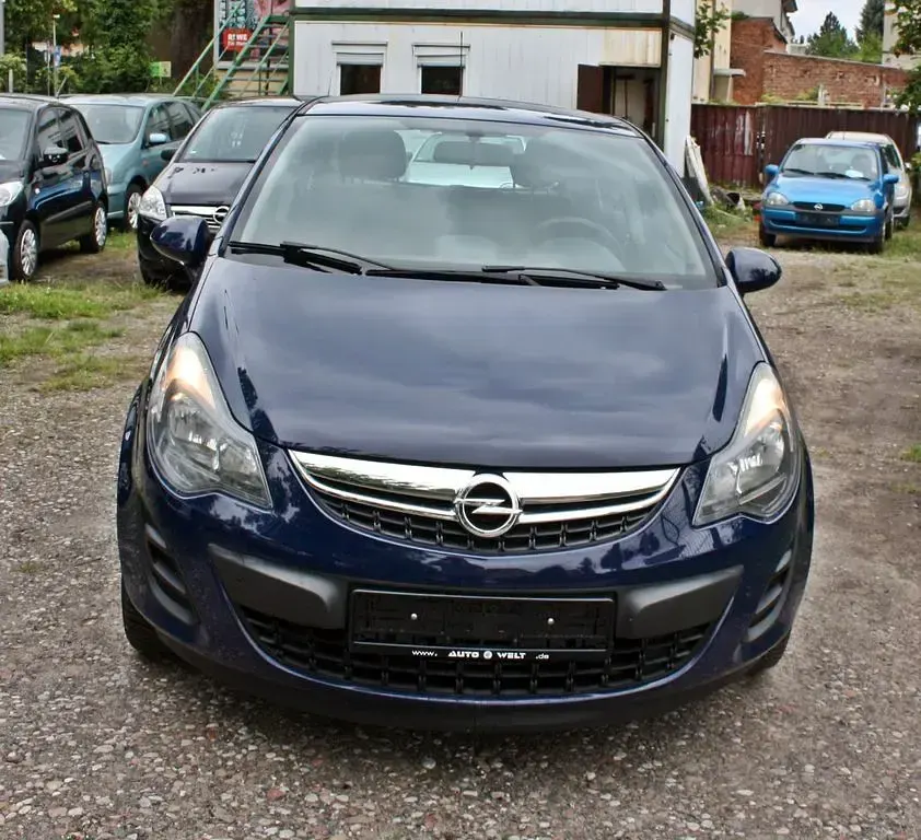 Używany Opel Corsa Edition 69 KM (50 kW) 2015 Niebieski Sedan/Limuzyna
