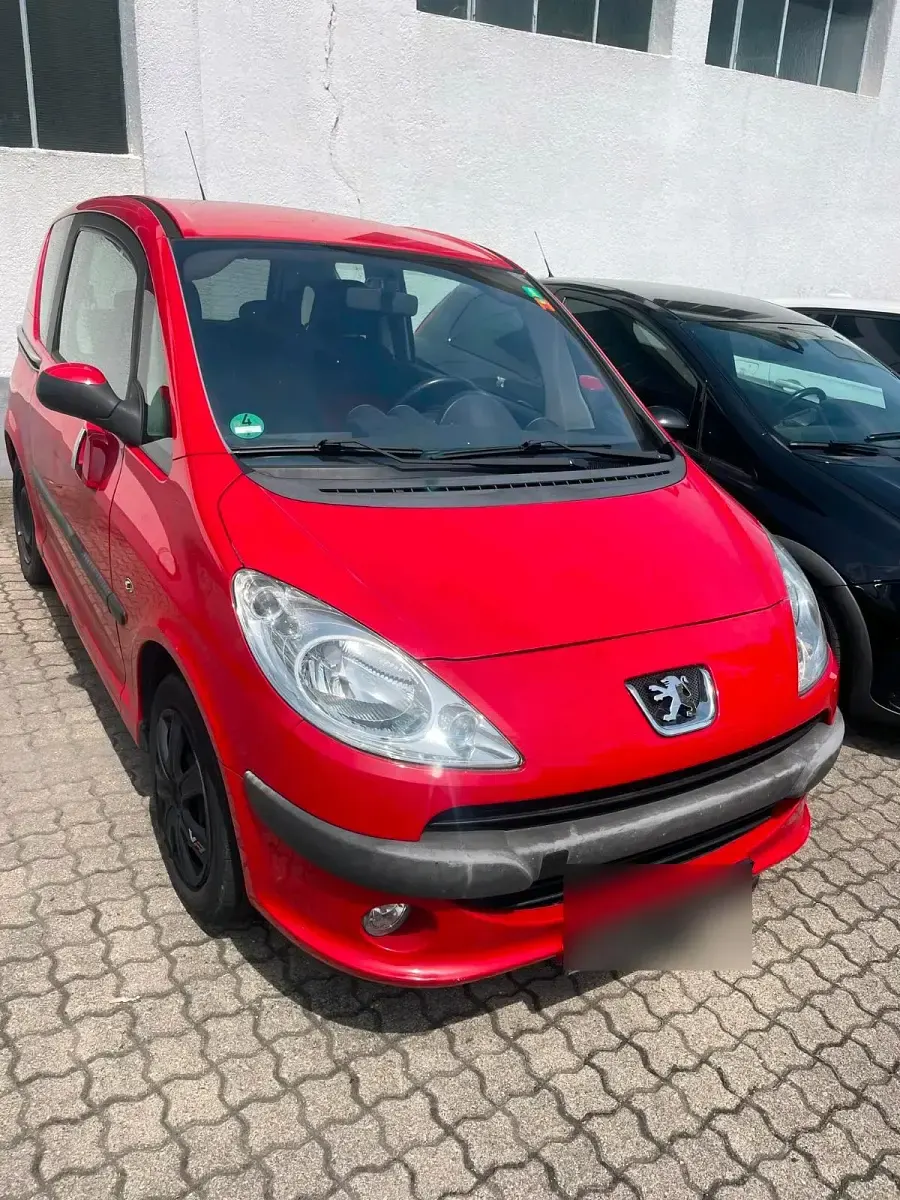 Gebraucht Peugeot 1007 54 PS (39 kW) 2007 Rot Van / Kleinbus