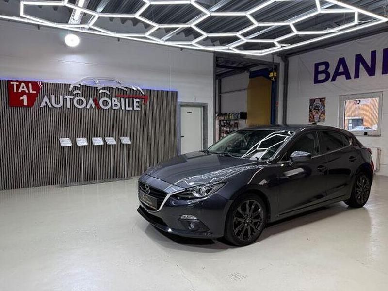 Grau Gebraucht 2016 Mazda 3 Nakama Limousine | 13.490 € (Fairer Preis) - Bild 1/4