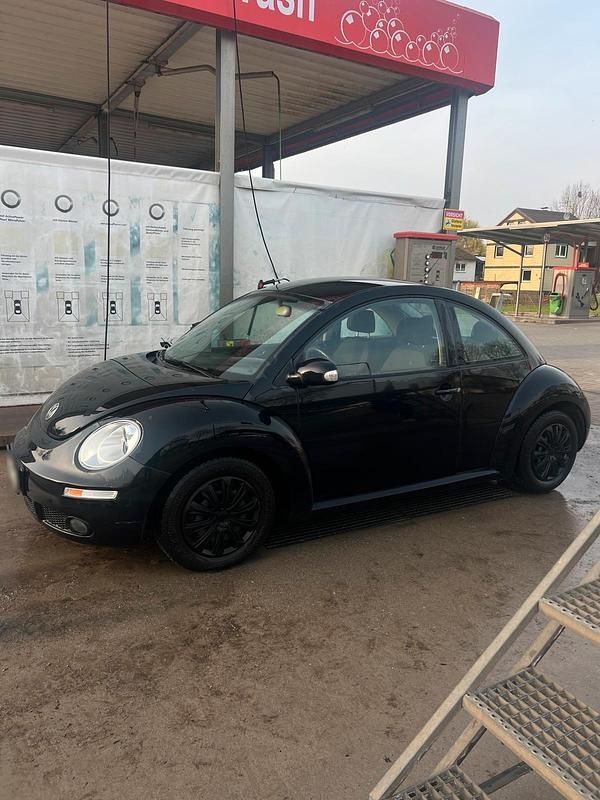 Gebraucht VW New Beetle 75 PS (55 kW) 2006 Schwarz Kleinwagen