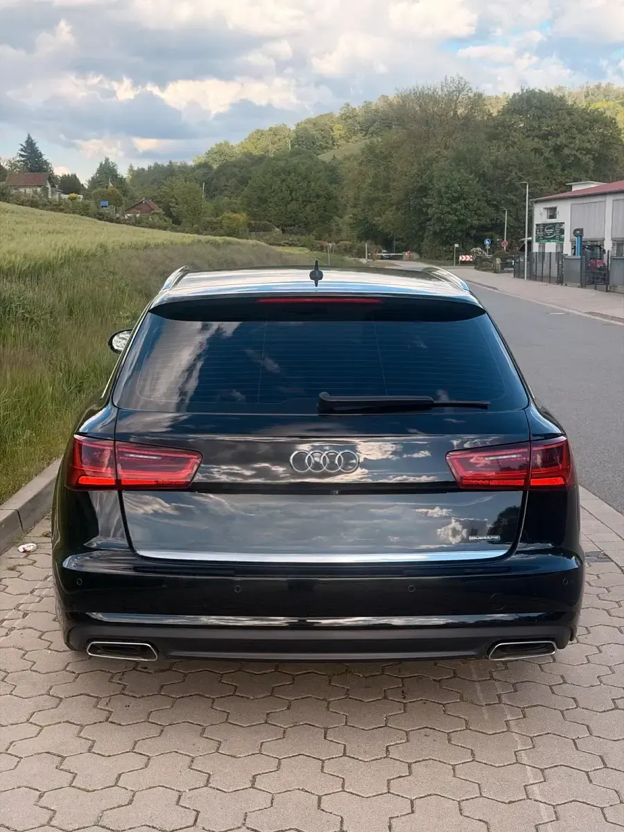 Używany Audi A6 272 KM (200 kW) 2015 Czarny Kombi