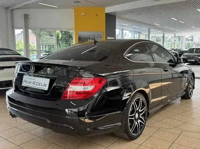 Gebraucht Mercedes C250 AMG line 204 PS (150 kW) 2015 Obsidianschwarz  metallic (metallic) Coupé