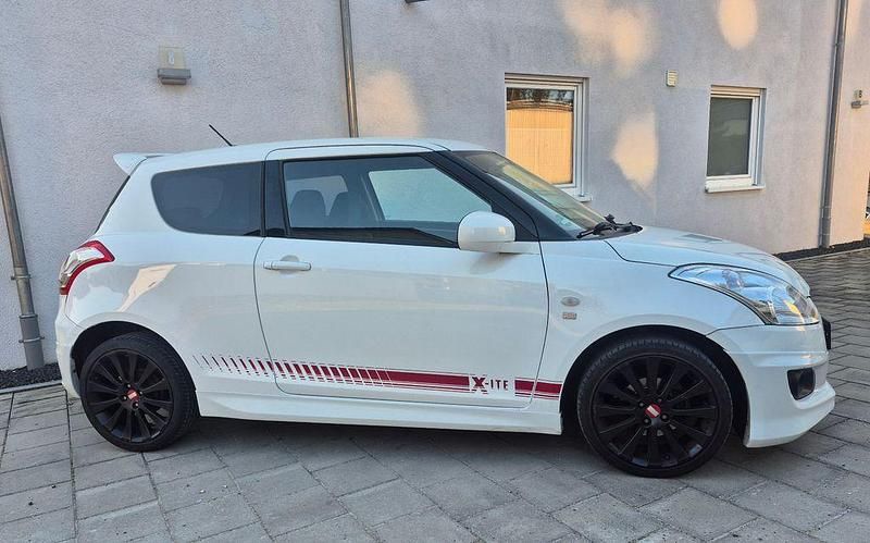 Second-hand Suzuki Swift 94 CP (69 kW) 2012 Alb Hatchback