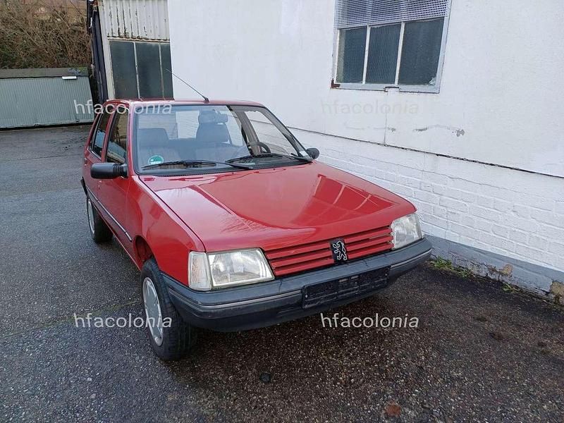 Gebraucht Peugeot 205 60 PS (44 kW) 1990 Rot Kleinwagen