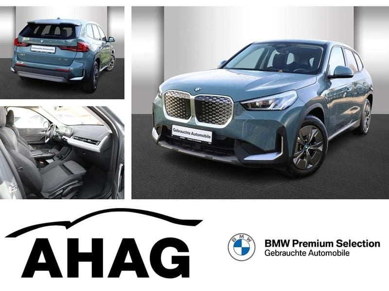 Cape york green metallic Gebraucht 2023 BMW iX1 SUV | 34.440 € (Superpreis) - Bild 1/4