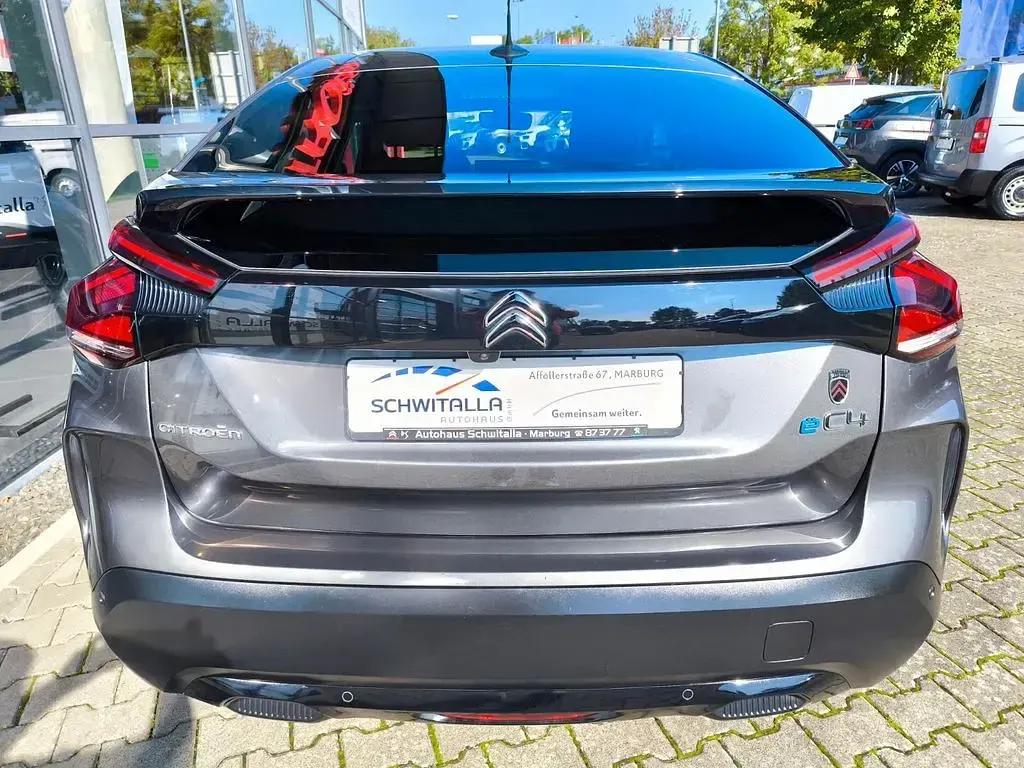 Używany Citroën e-C4 Feel 100 kW (136 KM) 2021 Szary Sedan/Limuzyna
