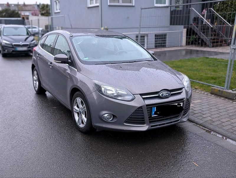 Gebraucht Ford Focus 101 PS (74 kW) 2012 Braun Kleinwagen