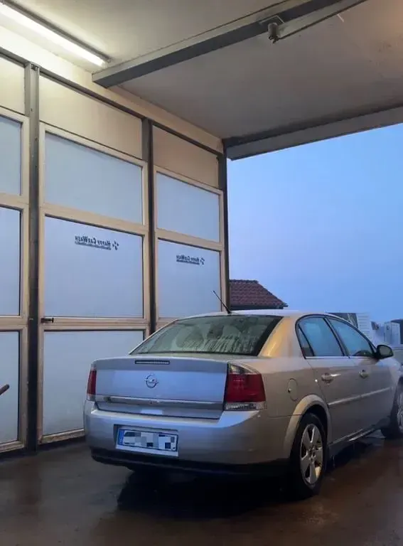 Second-hand Opel Vectra 155 CP (114 kW) 2004 Argintiu Berlinǎ