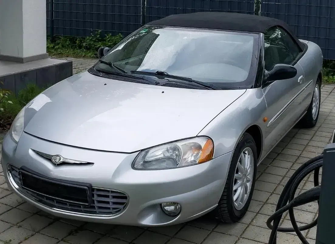 Second-hand Chrysler Sebring Cabriolet 203 CP (149 kW) 2003 Argintiu Cabrio