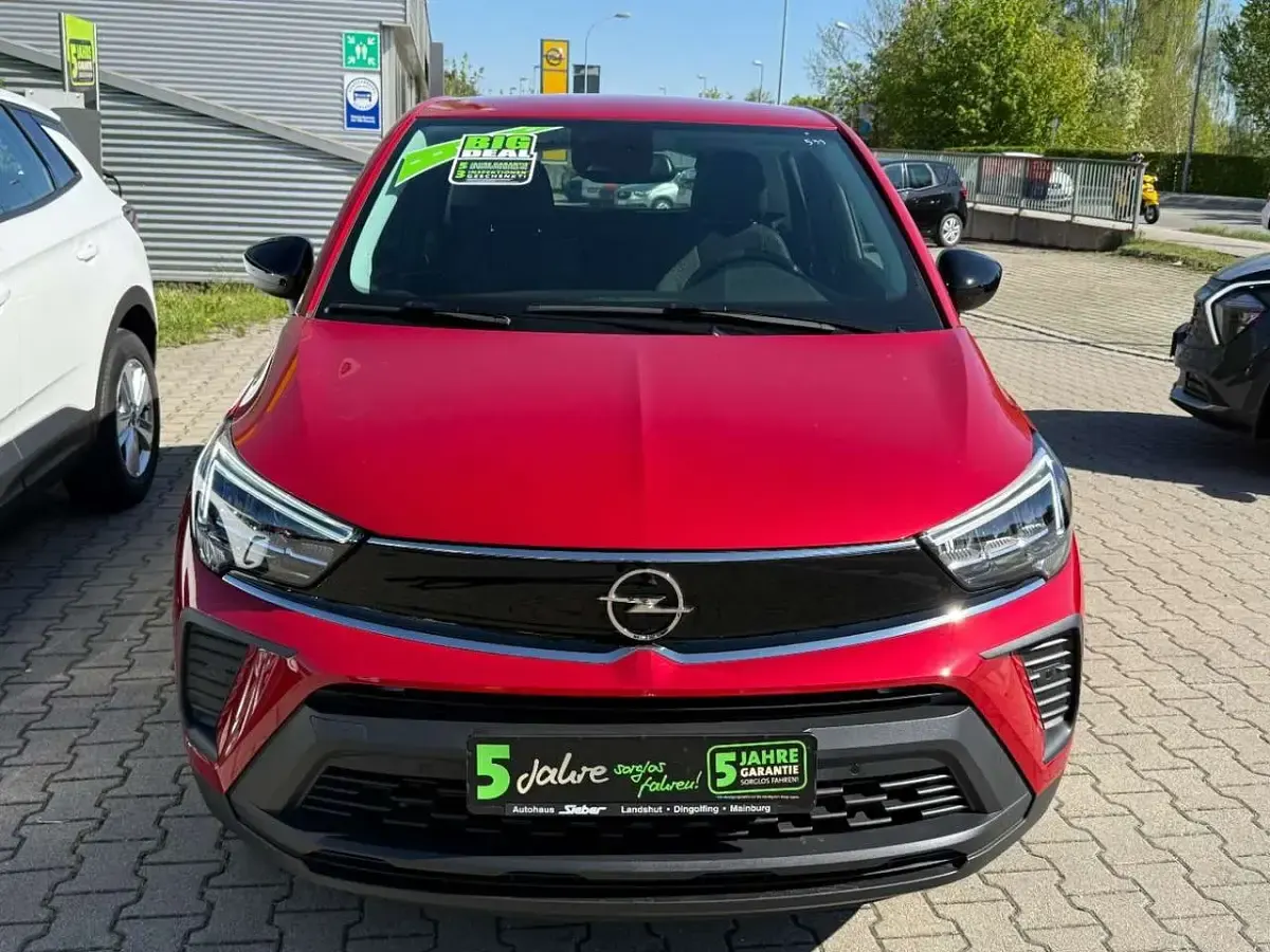 Gebraucht Opel Crossland X Enjoy 110 PS (80 kW) 2024 Lackierung peperoncino red/met SUV