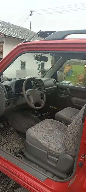 Używany Suzuki Jimny 80 KM (58 kW) 2000 Czerwony SUV