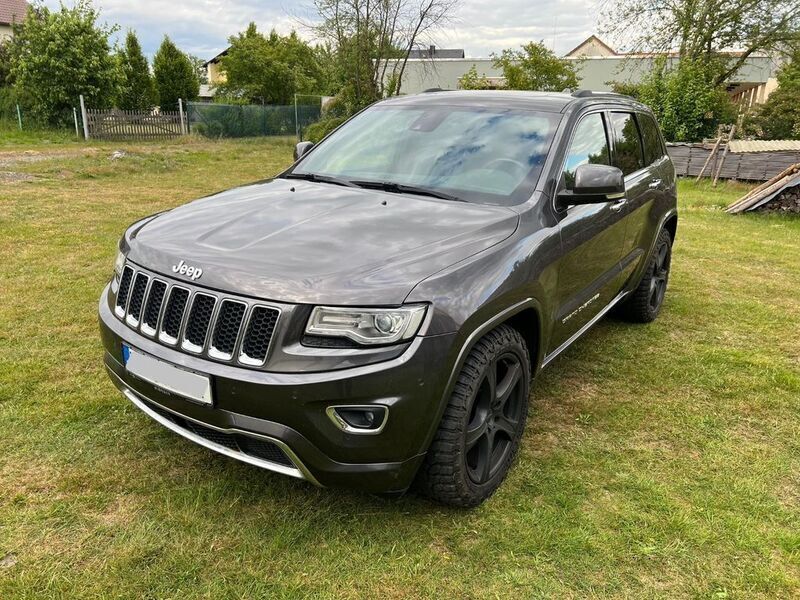 Grau Gebraucht 2013 Jeep Grand Cherokee Overland SUV | 18.450 € (Fairer Preis) - Bild 1/4