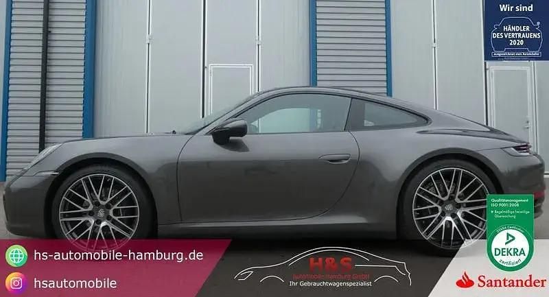 Grau Gebraucht 2024 Porsche 911 Carrera Coupé | 128.900 € (Fairer Preis) - Bild 1/4