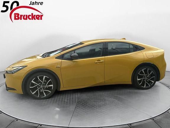 Gebraucht Toyota Prius Executive 223 PS (164 kW) 2023 Mustard metallic Kleinwagen