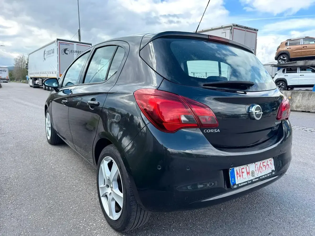 Używany Opel Corsa 90 KM (66 kW) 2015 Czarny Hatchback