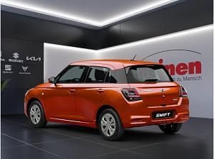 Gebraucht Suzuki Swift Club 83 PS (61 kW) 2024 Orange (flame orange pearl metallic) Kleinwagen