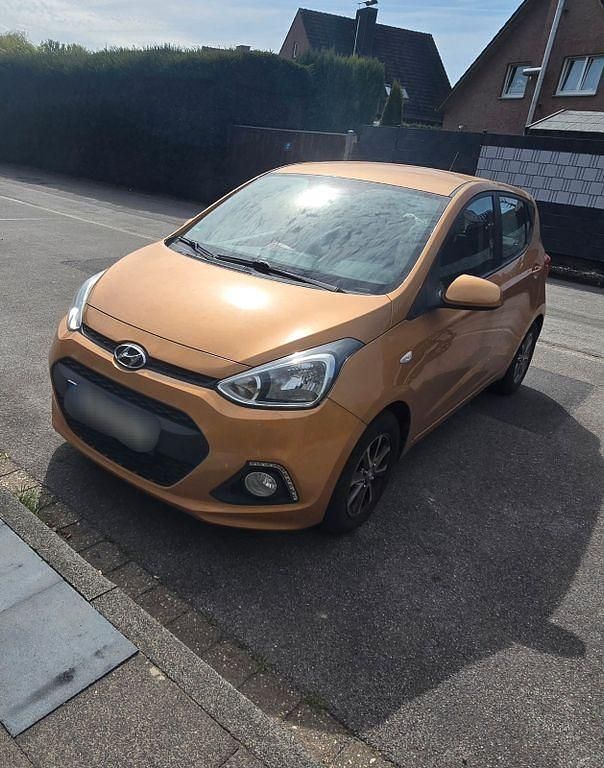 Gebraucht Hyundai i10 67 PS (49 kW) 2014 Orange Kleinwagen