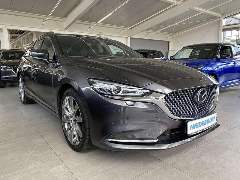 Machine gray Gebraucht 2023 Mazda 6 Takumi-Line Kombi | 32.700 € (Fairer Preis) - Bild 1/4