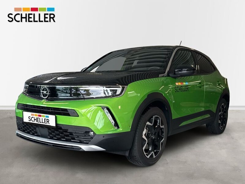 Grün Gebraucht 2024 Opel Mokka-e Ultimate SUV | 41.490 € - Bild 1/4