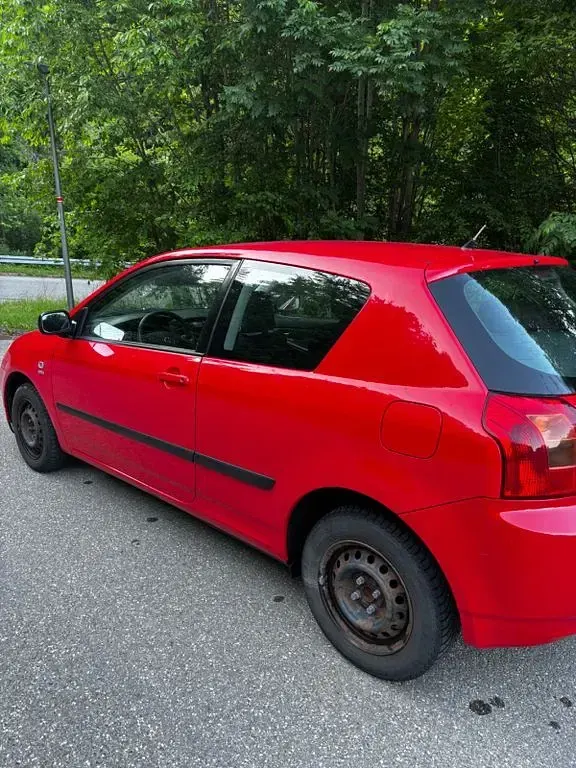 Gebraucht Toyota Corolla 97 PS (71 kW) 2003 Rot Limousine