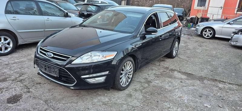 Gebraucht Ford Mondeo Titanium 160 PS (117 kW) 2013 Pantherschwarz metallic Kombi
