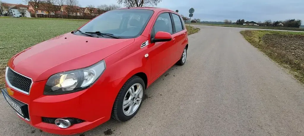 Gebraucht Chevrolet Aveo LT 101 PS (74 kW) 2011 Rot Limousine