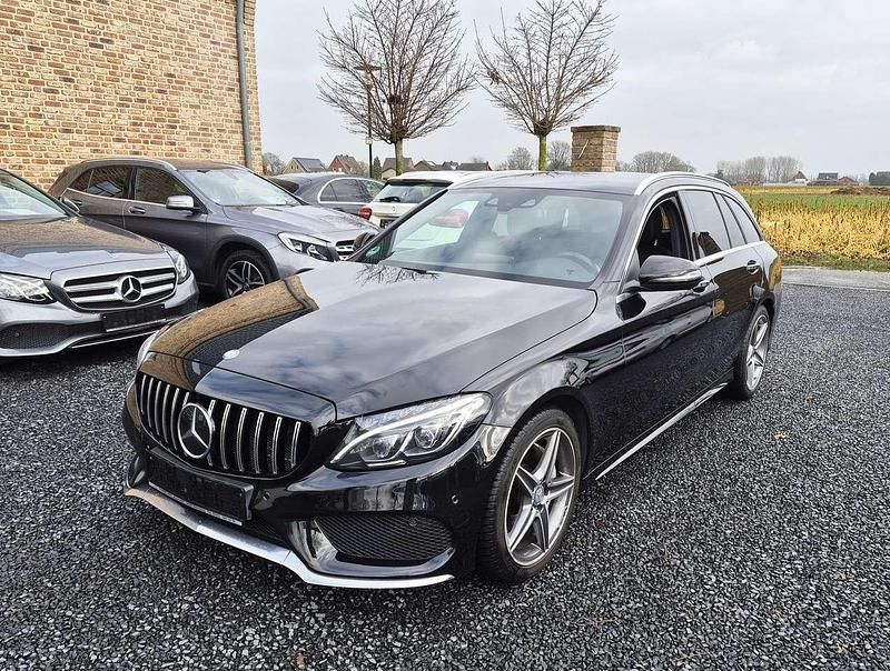 Gebraucht Mercedes C200 AMG line 184 PS (135 kW) 2015 Obsidianschwarz  metalliclack Kombi