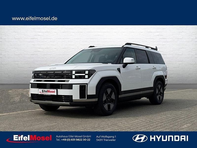 Creamy white Neu 2025 Hyundai Santa Fe Intro Edition SUV | 54.960 € - Bild 1/4