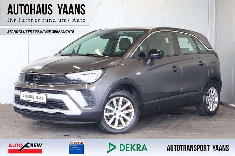 Mondstein grau/e:vulkan grau Gebraucht 2021 Opel Crossland X Elegance SUV | 10.489 € (Superpreis) - Bild 1/4