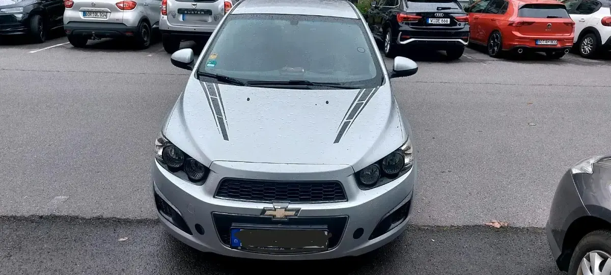 Gebraucht Chevrolet Aveo 100 PS (73 kW) 2012 Silber Limousine