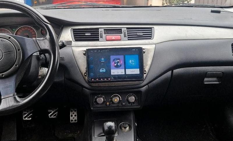 Schwarz Gebraucht 2006 Mitsubishi Lancer Kombi | 1.100 € - Bild 1/4