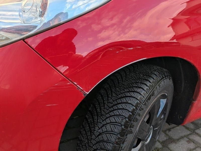 Gebraucht Peugeot 206+ 73 PS (53 kW) 2012 Rot Kleinwagen