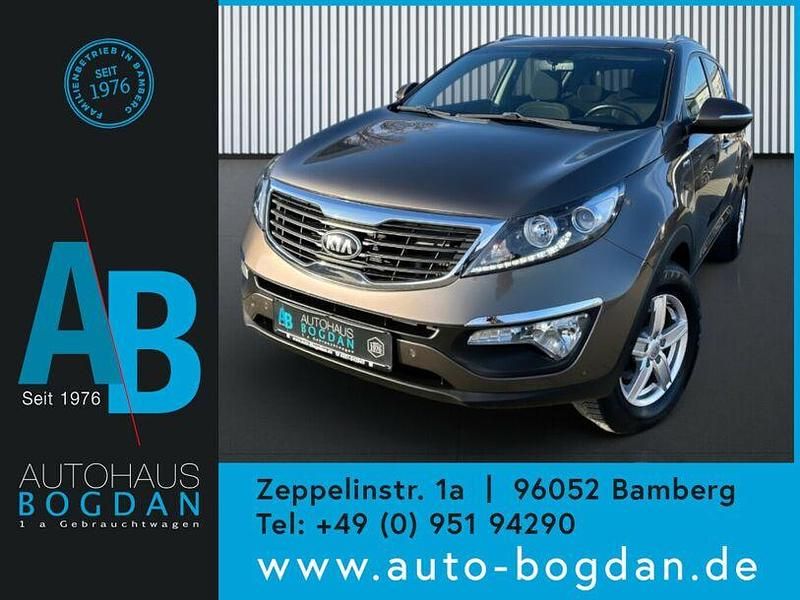 Braun Gebraucht 2014 Kia Sportage DREAM-TEAM Edition SUV | 8.990 € (Fairer Preis) - Bild 1/4